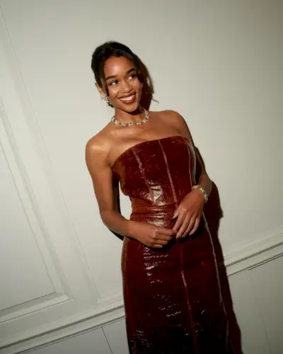 Celebrity party outfits: @lauraharrier wears a leather-look dress and diamond jewellery