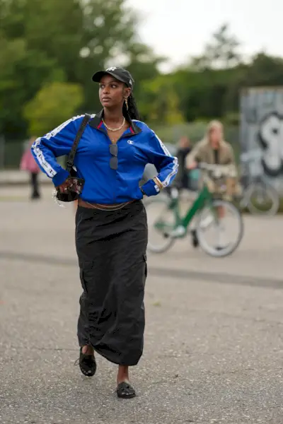 Woman wearing cobalt blue jacket during Copenhagen Fashion Week.
