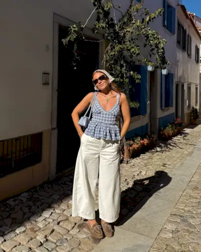 An image of @rebeccaferrazwyatt wearing one of the best gingham tops.