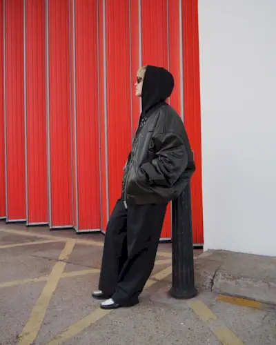 @alexisforeman wears an oversized bomber jacket