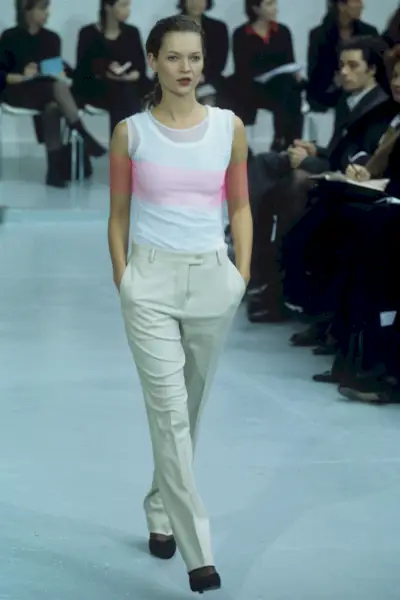 Kate Moss walking in the Helmut Lang fall/winter 1997 show.