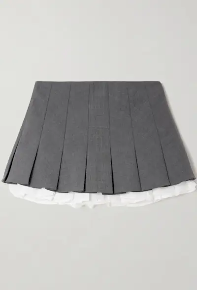 An image of a Shushu Tong mini skirt, a staple of preppy fashion.