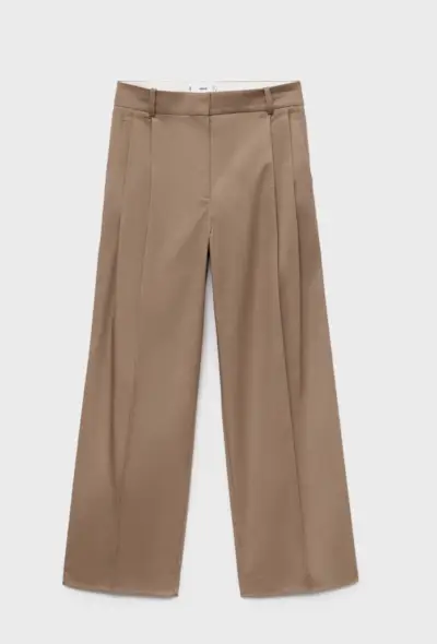 An image of Mango pleated trousers, a staple of preppy fashion.