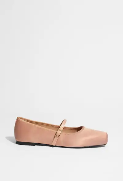 An image of & Other Stories ballet flats, a staple of preppy fashion.