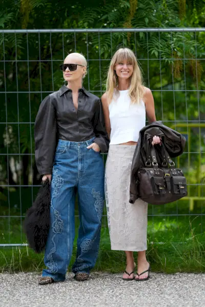 Influencer wears embellished jeans at Copenhagen Fashion Week ss26.