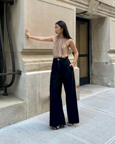 Influencer wears a halterneck blouse