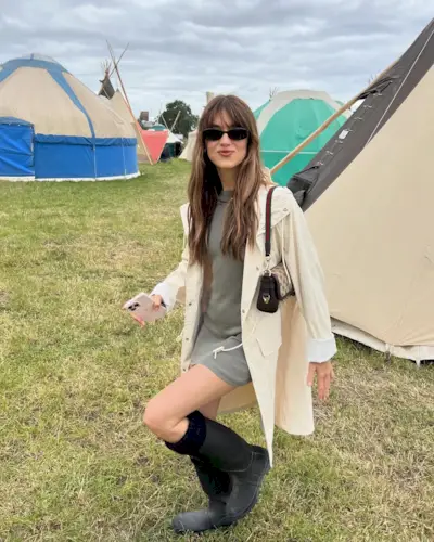 An image of @daisyedgarjones wearing a musical festival outfit.
