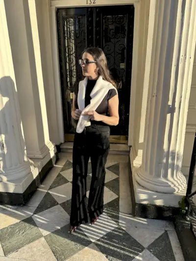 An image of Mommy's Reviews SEO Writer Ava Gilchrist wearing one of the best flared jeans.