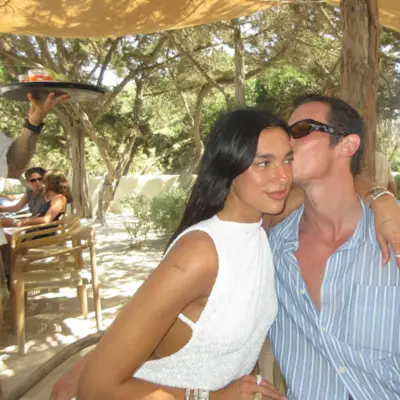 Dua Lipa wears a thong-exposing dress in Ibiza