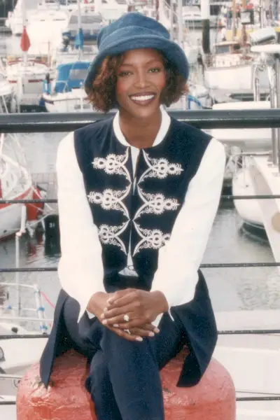 Naomi Campbell wearing a bucket hat in the '90s.