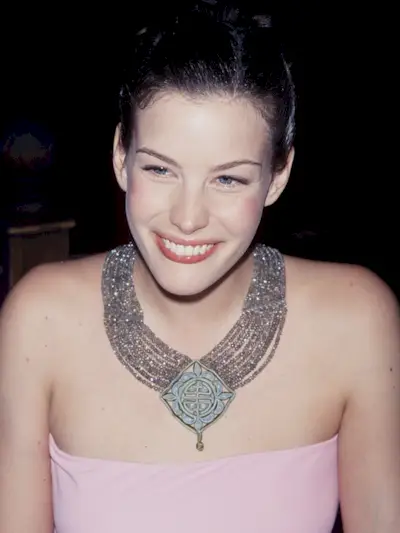 Liv Tyler wearing a tube top in the '90s.