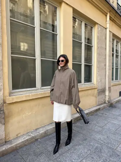 Coco Schiffer wearing knee-high boots