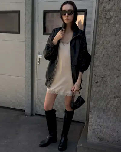 Beatrice Gutu wearing knee-high boots