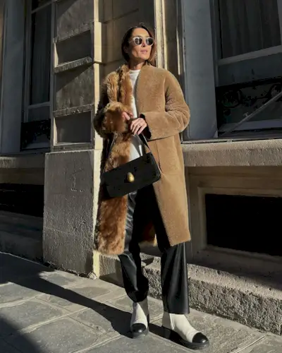 woman in leather pants and coat