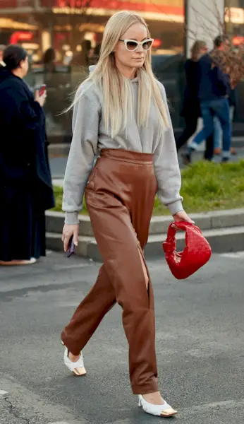 woman wearing leather pants and blouse