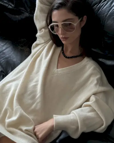 Woman in large curved aviators