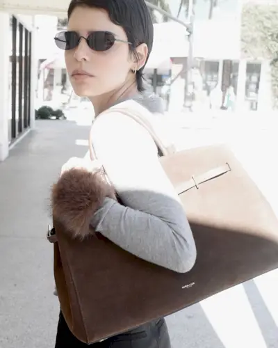 Woman in oval sunglasses