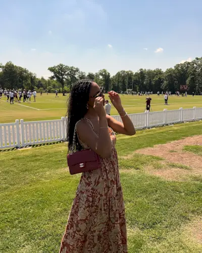 Woman wearing a football stadium outfit idea.