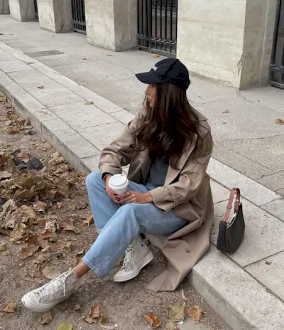 Influencer wears converse trainers.