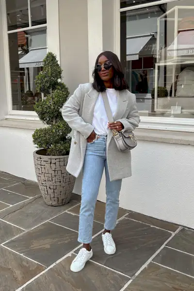 woman wearing white sneakers