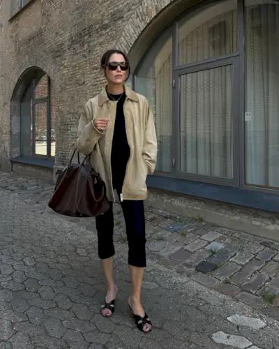 @annabelrosendahl wearing a brown bag with leggings and jacket