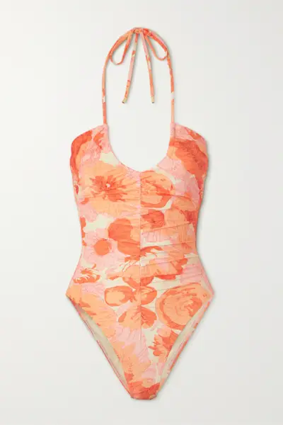 an orange and pink floral one-piece halter swimsuit