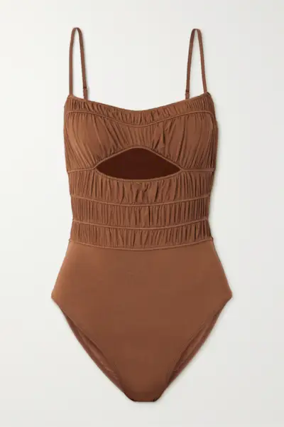 a brown one-piece swimsuit with a ruched top half and a cutout at the bust