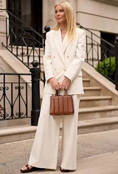 Gwyneth Paltrow wears the brown Whitney Bag courtesy of Max Mara