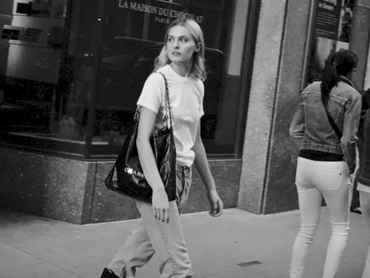 woman wearing white t-shirt and jeans