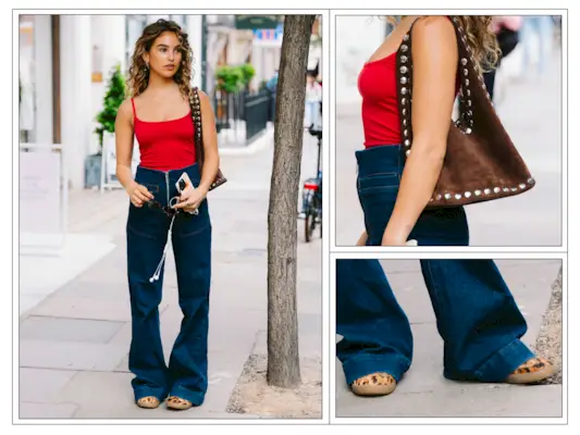 A woman wears a red top, flares and leopard trainers in London