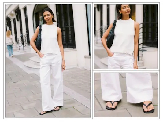 A woman wears white trousers and a white sleeveless knit in London