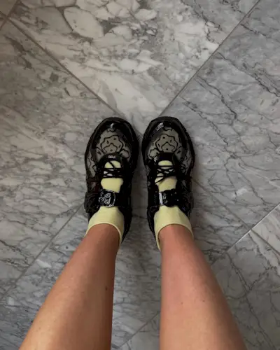 An image of @rebeccaferrazwyatt wearing Mary Jane sneakers.