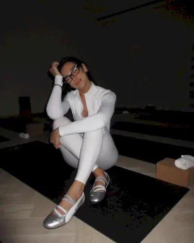 An image of @dualipa wearing Mary Jane sneakers.