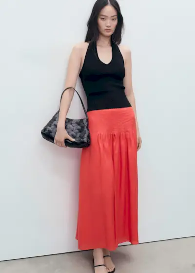 Red pleated skirt from Mango