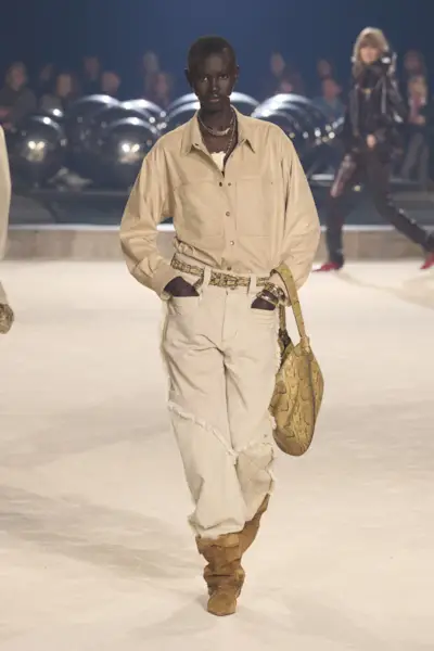 Isabel Marant model carrying a slouchy handbag on the runway