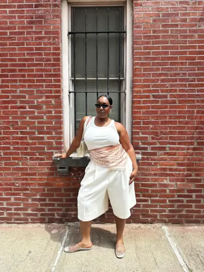 Aniyah in mesh flats and white culottes