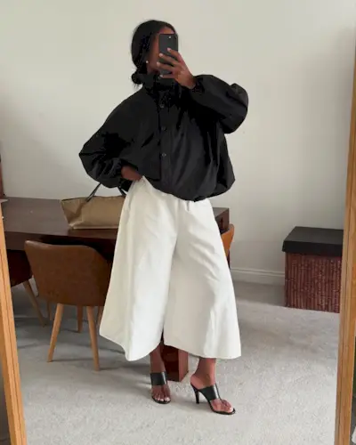 Marilyn in white culottes and black heels