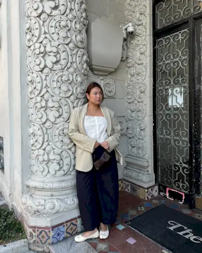 Marina in white Tabi flats and culottes