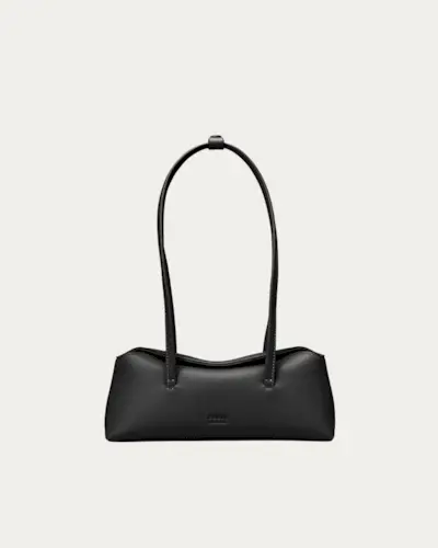 A collage of Kendall Jenner, Jennifer Lopez, and Dakota Johnson wearing the top wardrobe basics from 2024.