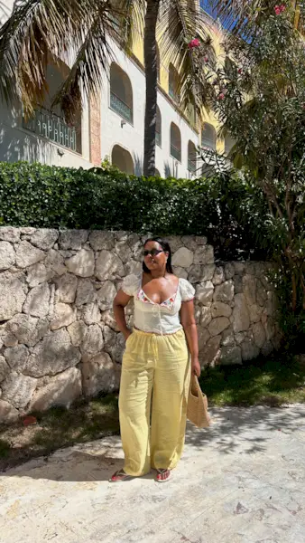 woman wears summer blouse