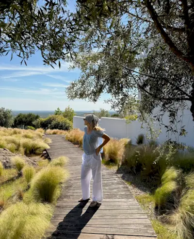 Woman wears pretty summer blouse