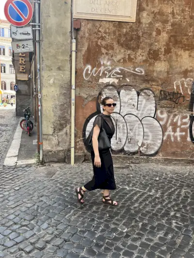 An image of Mommy's Reviews UK Ava Gilchrist wearing a Rue Sophie dress, one of the best luxury independent fashion brands.