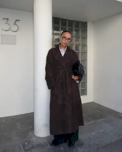 woman wearing brown suede jacket trend