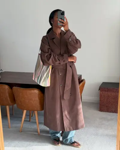 woman wearing brown suede jacket trend