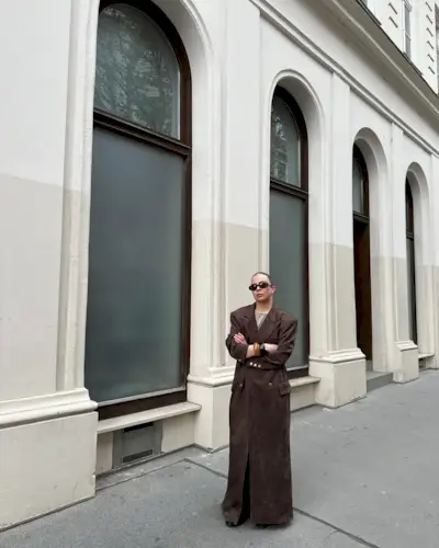 woman wearing brown suede jacket trend