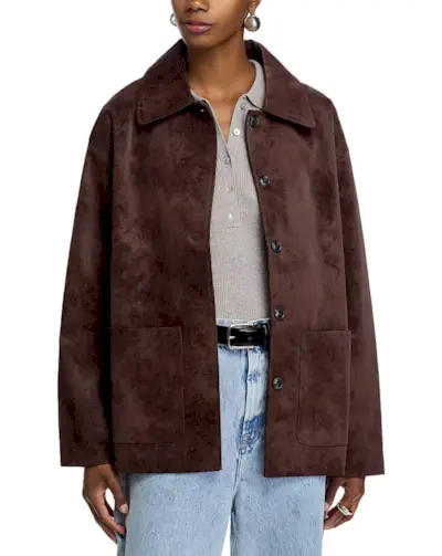 woman wearing brown suede jacket trend