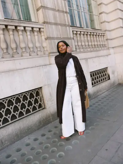 woman wearing brown suede jacket trend