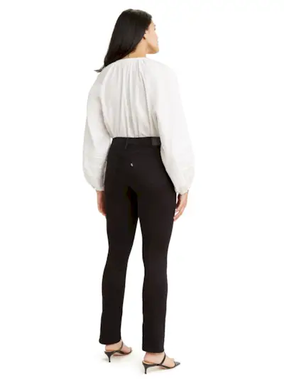 Model wearing black Levi's 312 Shaping Slim Fit jeans with back to camera