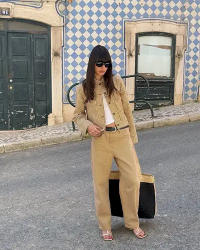 Summer Outfit Ideas 2025: @tamaramory wears beige jeans and a striped jacket