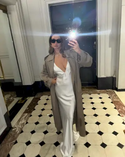 A strappy silk dress and trench outfit